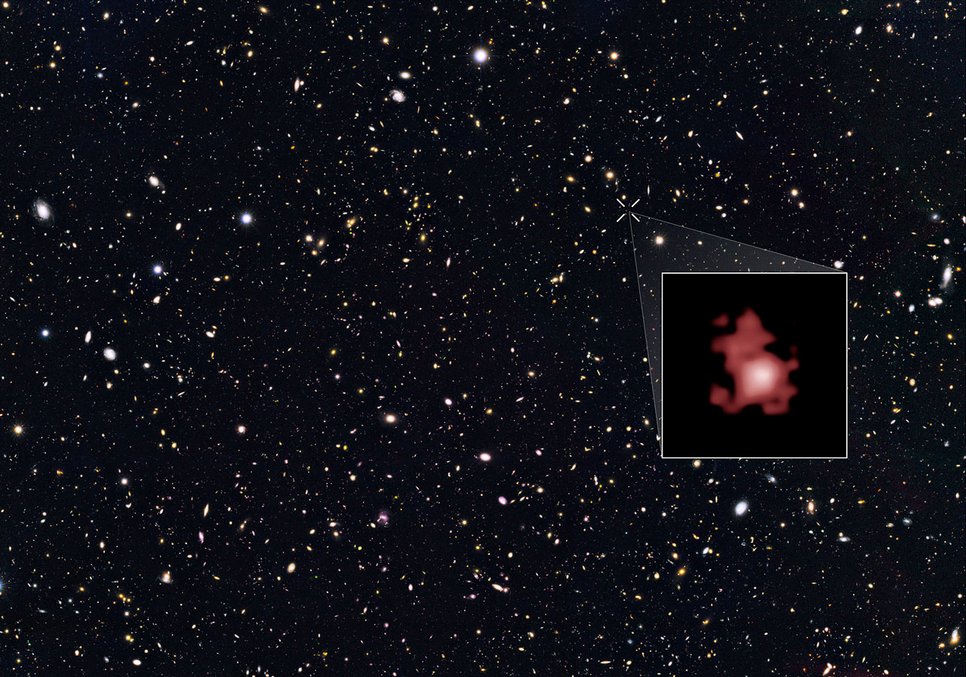 The Great Observatories Origins Deep Survey (GOODS) North survey: a deep-exposure image of countless distant galaxies with a cropped magnification of an irregularly shaped reddish spot
